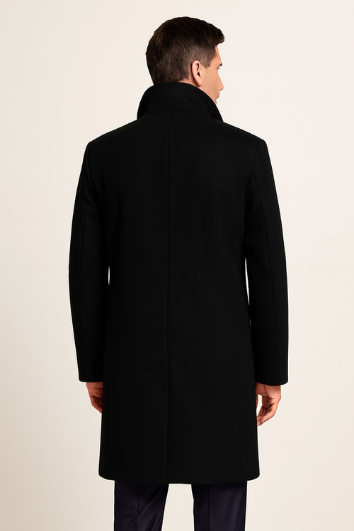 Back view of the men's black overcoat in black on a model