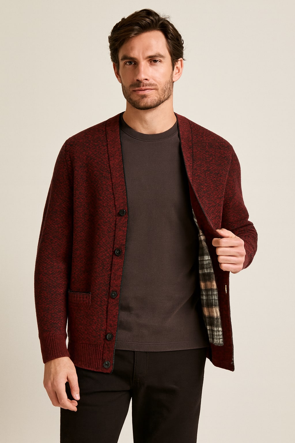 Men's Button Up Cardigan in red, textured cotton-feel knit, worn open to show the tartan-check lining