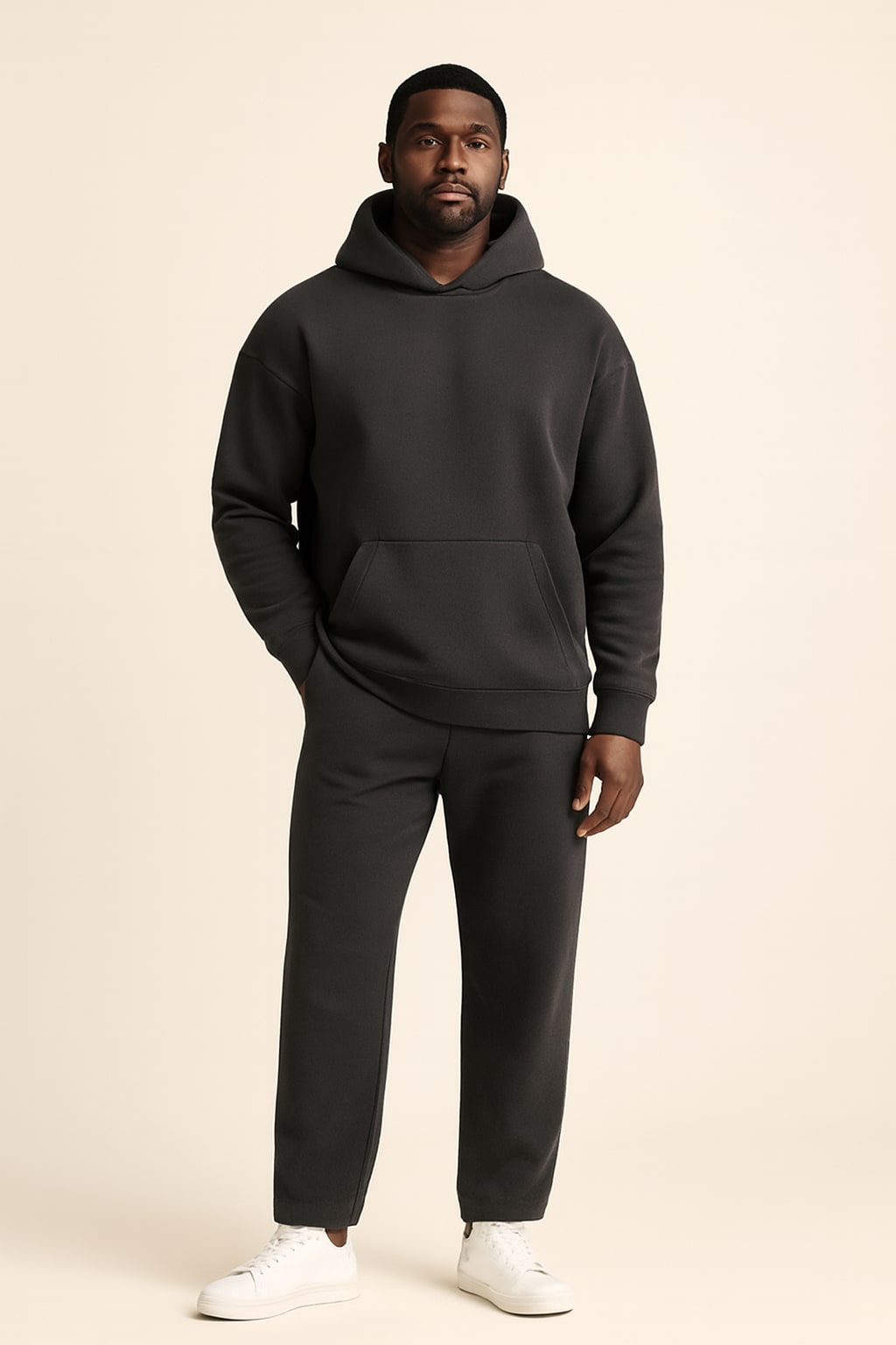 Men's Fleece Tracksuit in dark grey, oversized hoodie and joggers, front view on a model