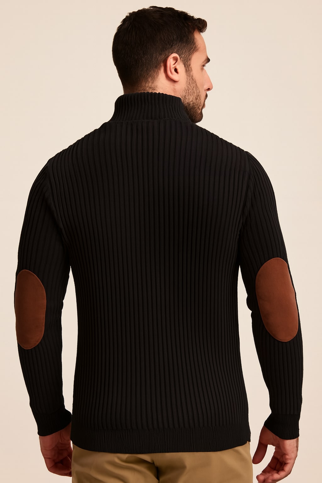 Back view of the men's half zip jumper in black on a model