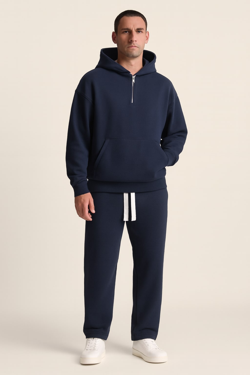 Men's Hoodie and Joggers Set in dark blue, matching tracksuit, front view on a model