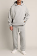 Men's Hoodie and Joggers Set in light grey, matching tracksuit, front view on a model