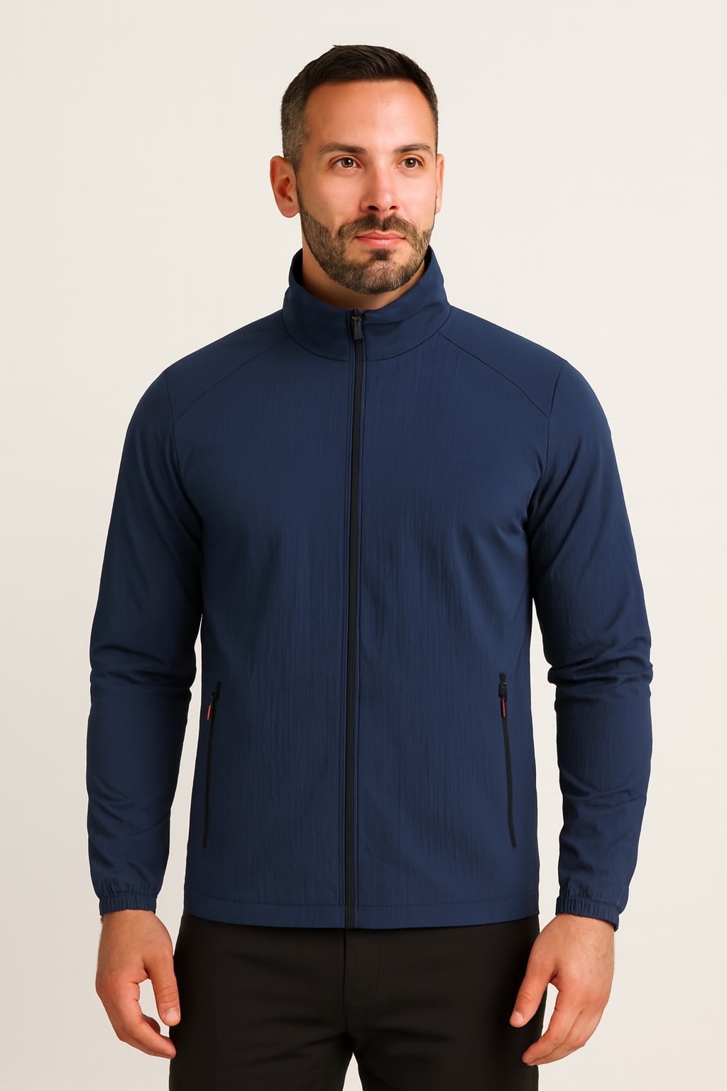 Men's Lightweight Jacket in dark blue, padded zip-up stand collar, front view on a model