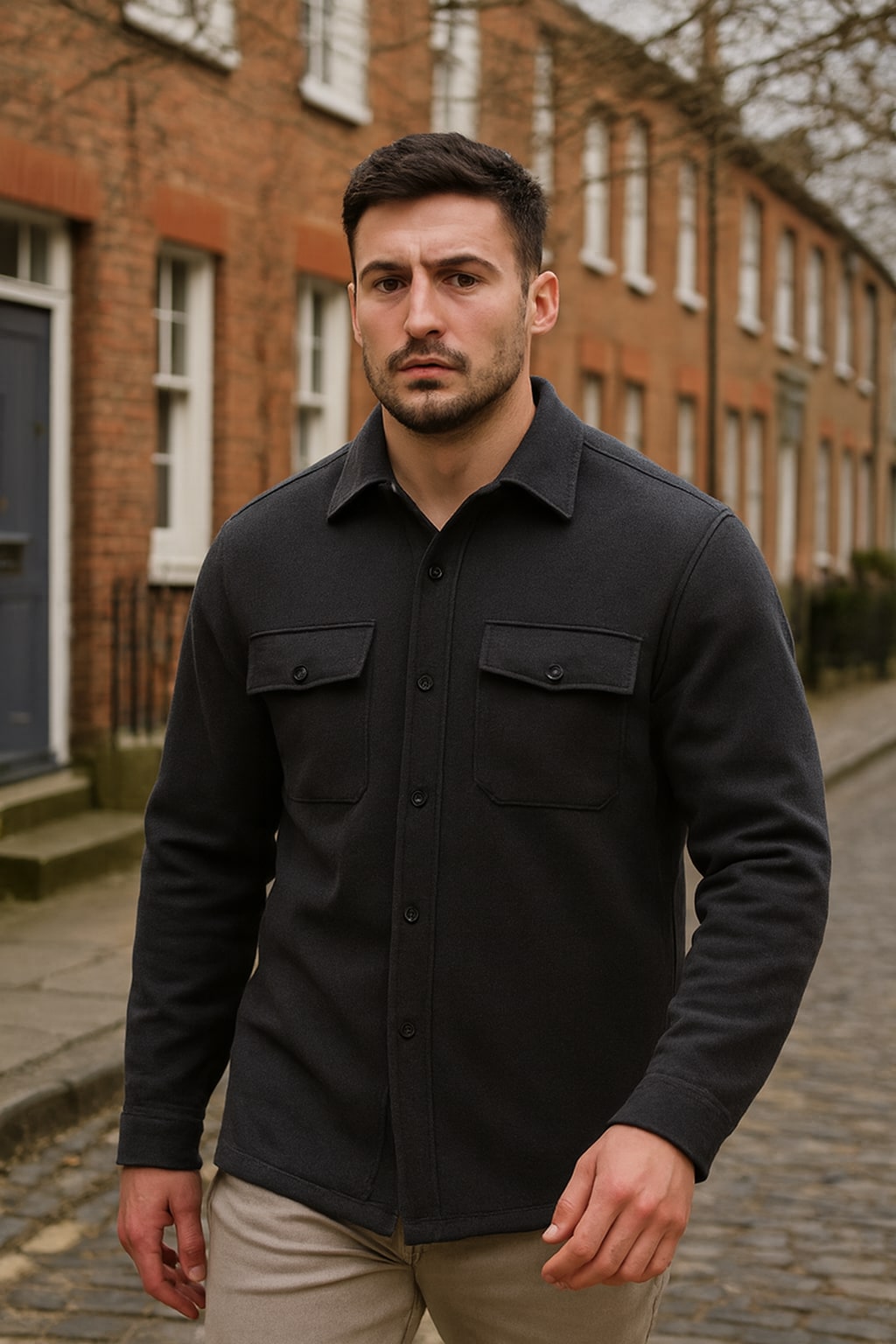 Man wearing the men's overshirt on an autumn street