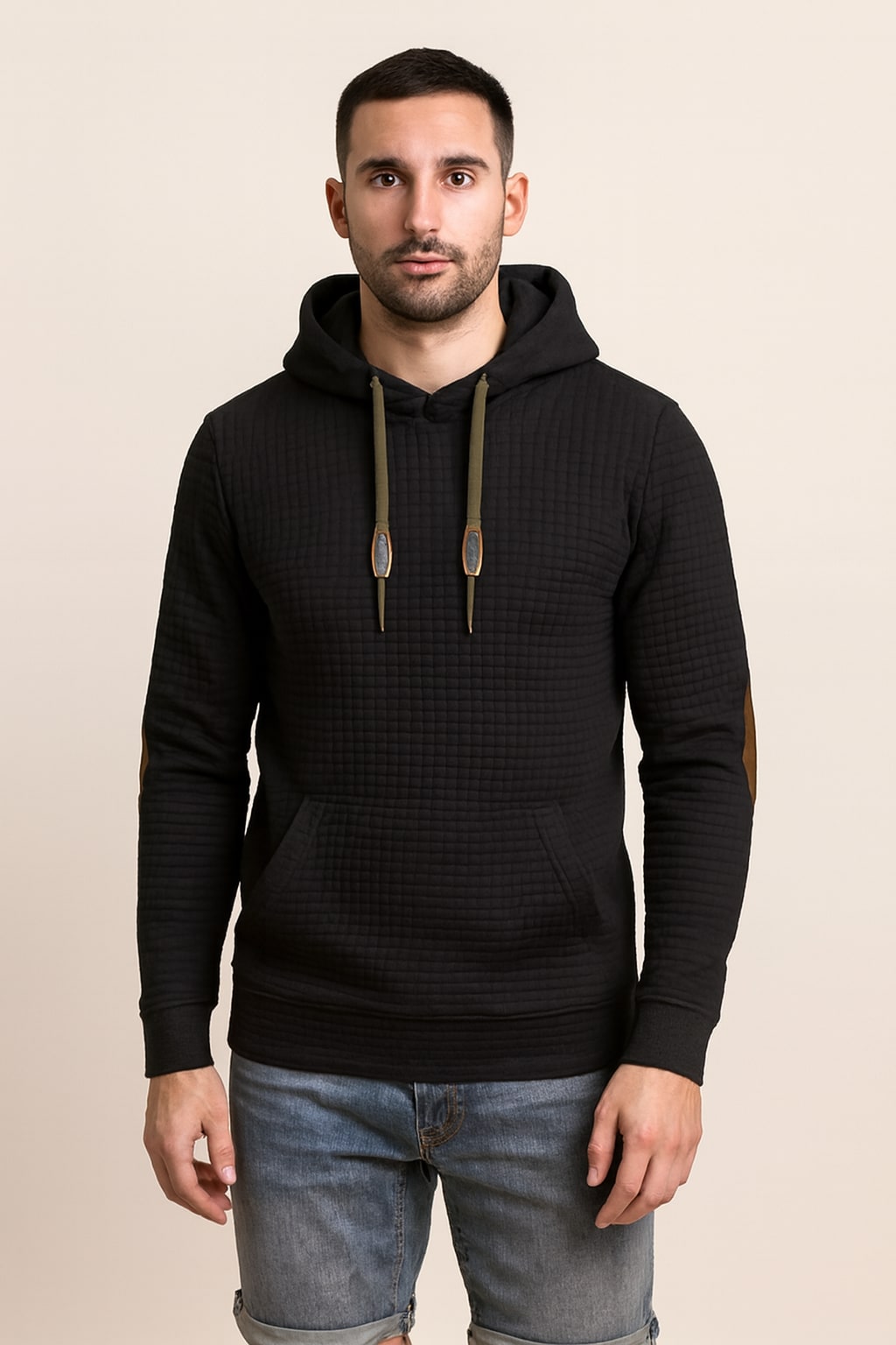 Men's Pullover Hoodie in black, classic drawstring hood, front view on a model