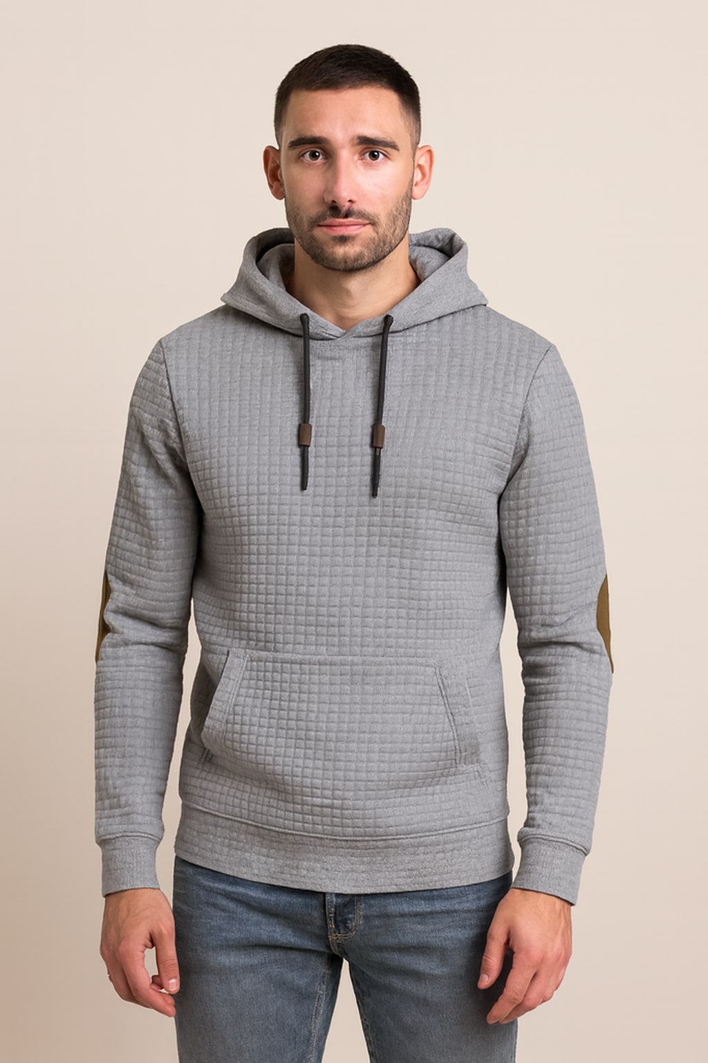 Men's Pullover Hoodie in grey, classic drawstring hood, front view on a model