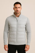 Men's Quilted Puffer Jacket in light grey, fleece sleeve hybrid, front view on a model
