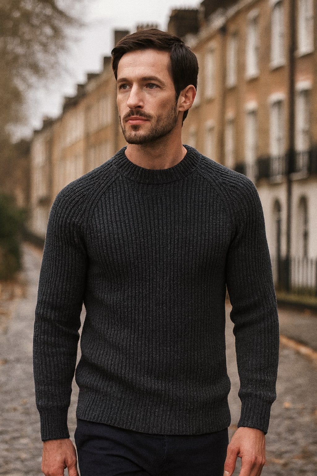 Man wearing the men's ribbed jumper on an autumn street